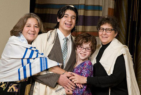 “Tammy” with her “mothers” and “older brother Edgar” at his recent bar mitzvah. 